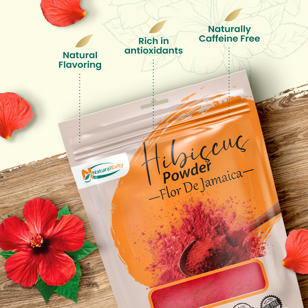 Flor De Jamaica Hibiscus Powder package with hibiscus flowers on a wooden surface, herbal powder for health and wellness.